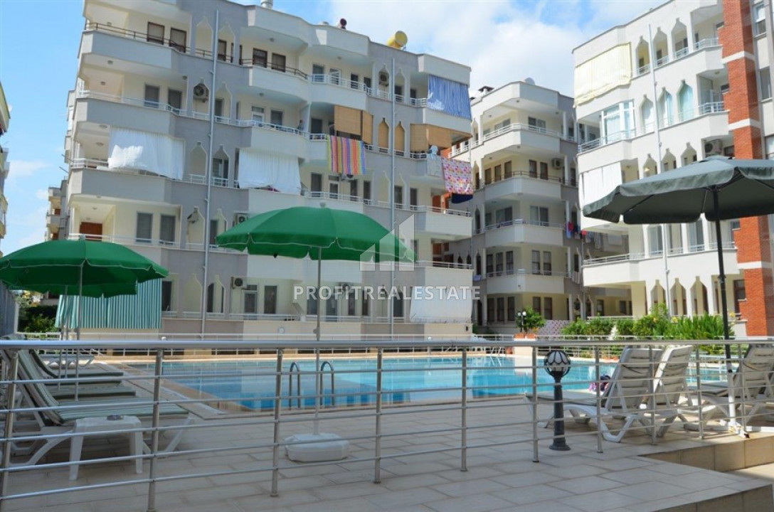 Inexpensive resale property: two bedroom apartment 400m from the sea with furniture and appliances in Mahmutlar ID-6346 фото-2