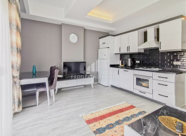 Отличное сочетание цены и качества: меблированная квартира с одной спальней недалеко от моря в Махмутларе ID-6367 фото-3