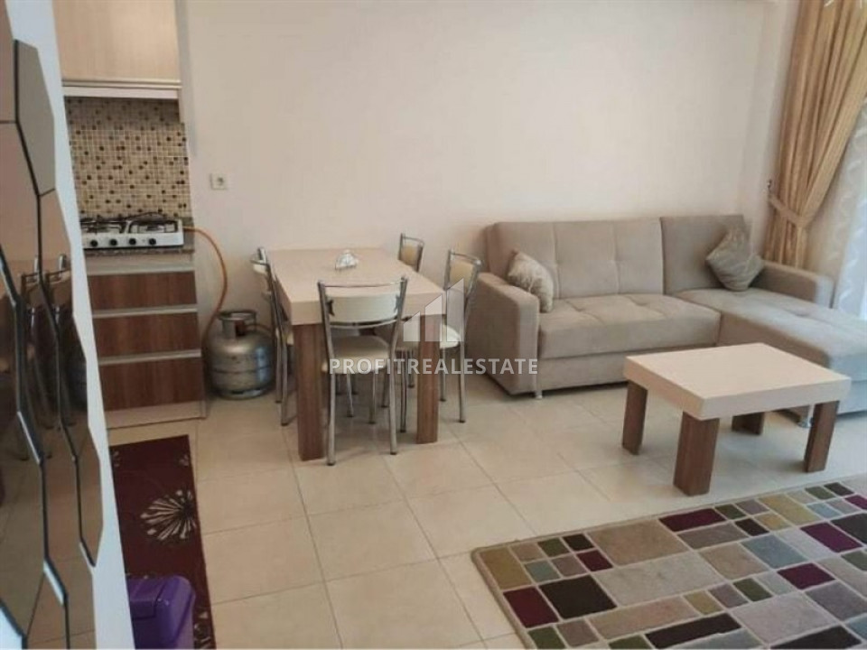 Budget resale property 200 m from the sea: furnished apartment 1 + 1, 65 m² in Mahmutlar ID-6373 фото-2