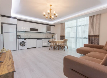 New furnished apartment 2 + 1 250 m from the sea in a residence with good facilities in Mahmutlar ID-6380 фото-1