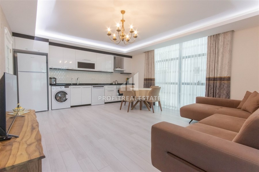 New furnished apartment 2 + 1 250 m from the sea in a residence with good facilities in Mahmutlar ID-6380 фото-1