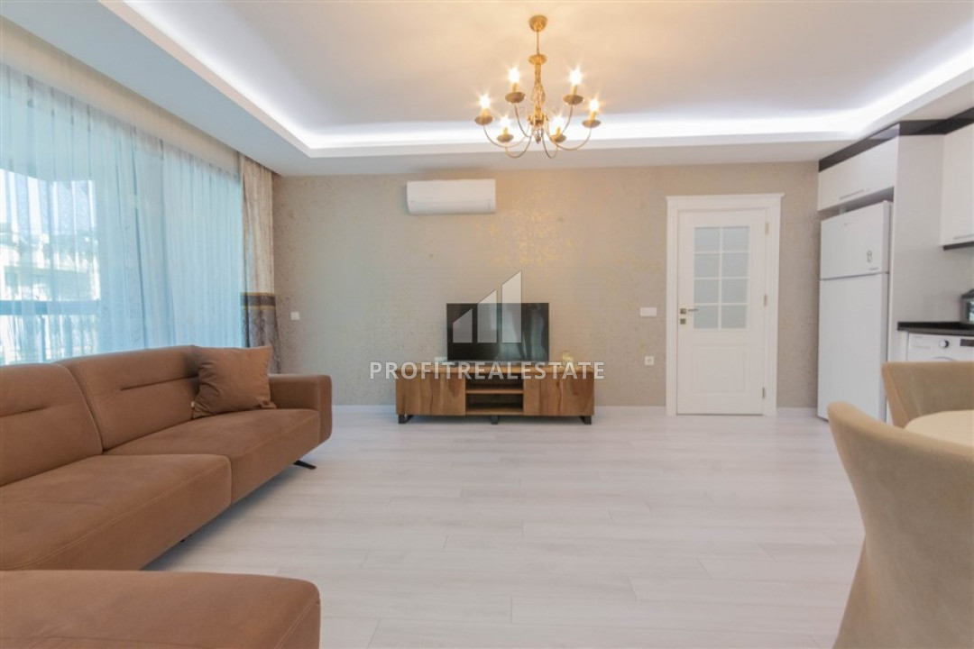 New furnished apartment 2 + 1 250 m from the sea in a residence with good facilities in Mahmutlar ID-6380 фото-2