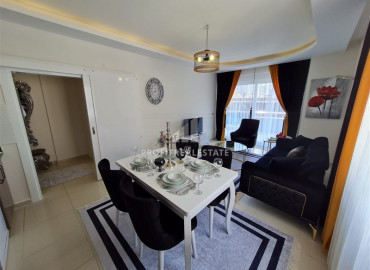Большая меблированная квартира с одной спальней, площадью 75 м² в 150 м от моря в Махмутларе ID-6381 фото-4
