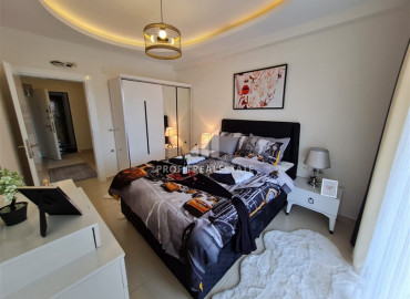 Большая меблированная квартира с одной спальней, площадью 75 м² в 150 м от моря в Махмутларе ID-6381 фото-6