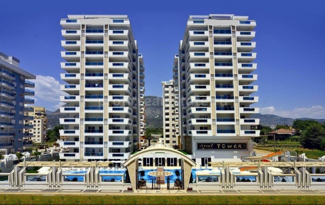 Меблированные апартаменты в комплексе с инфраструктурой 5* отеля в Махмутларе, Алания ID-0426 фото-2
