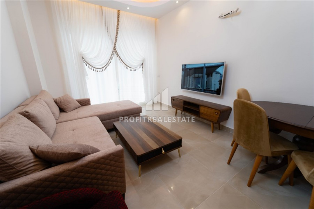 In an elite residence: 1 + 1 apartment with furniture, 400 m from the beaches of Mahmutlar ID-6392 фото-2