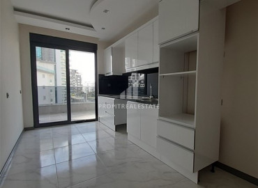 Трехкомнатная квартира с отдельной кухней в новом доме с богатой инфраструктурой в Махмутларе ID-6404 фото-2