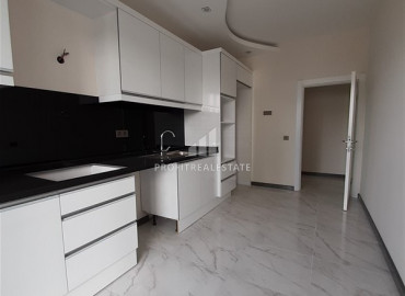 Трехкомнатная квартира с отдельной кухней в новом доме с богатой инфраструктурой в Махмутларе ID-6404 фото-3