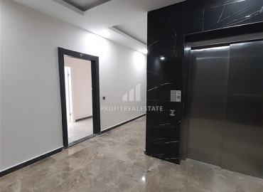 Трехкомнатная квартира с отдельной кухней в новом доме с богатой инфраструктурой в Махмутларе ID-6404 фото-26