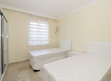 Квартира в комплексе с двумя спальнями по отличной цене в Махмутларе, Алания ID-0432 фото-21