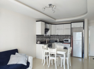 Furnished one-bedroom apartment in a residence with facilities, 300 meters from the sea in Mahmutlar ID-6441 фото-2