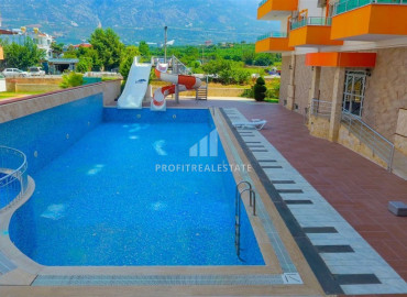 Two bedroom apartment with mountain views in Mahmutlar close to the sea ID-6445 фото-1}}