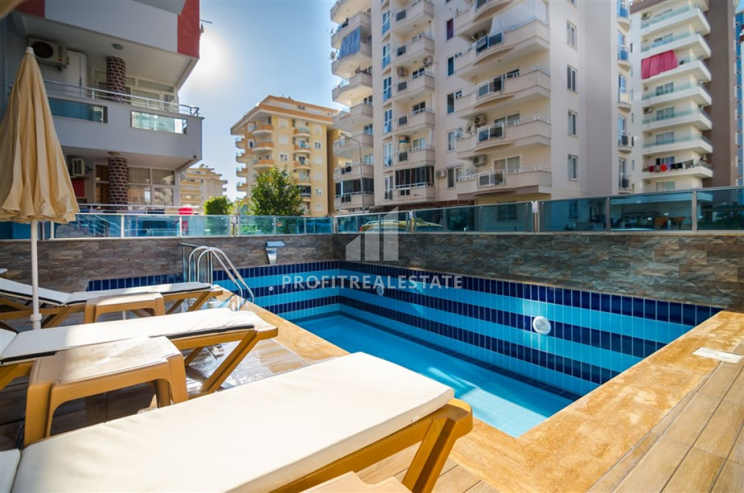 New duplex 3 + 1 250 from the sea in a residence with good facilities in Mahmutlar ID-6454 фото-2
