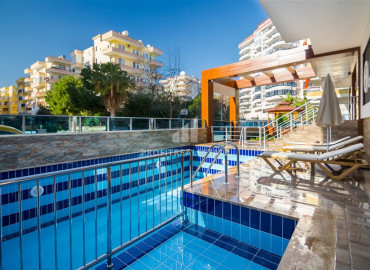 New duplex 3 + 1 250 from the sea in a residence with good facilities in Mahmutlar ID-6454 фото-3
