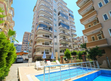 Inexpensive resale property 300m from the sea: furnished apartment 1 + 1 in Mahmutlar ID-6466 фото-1