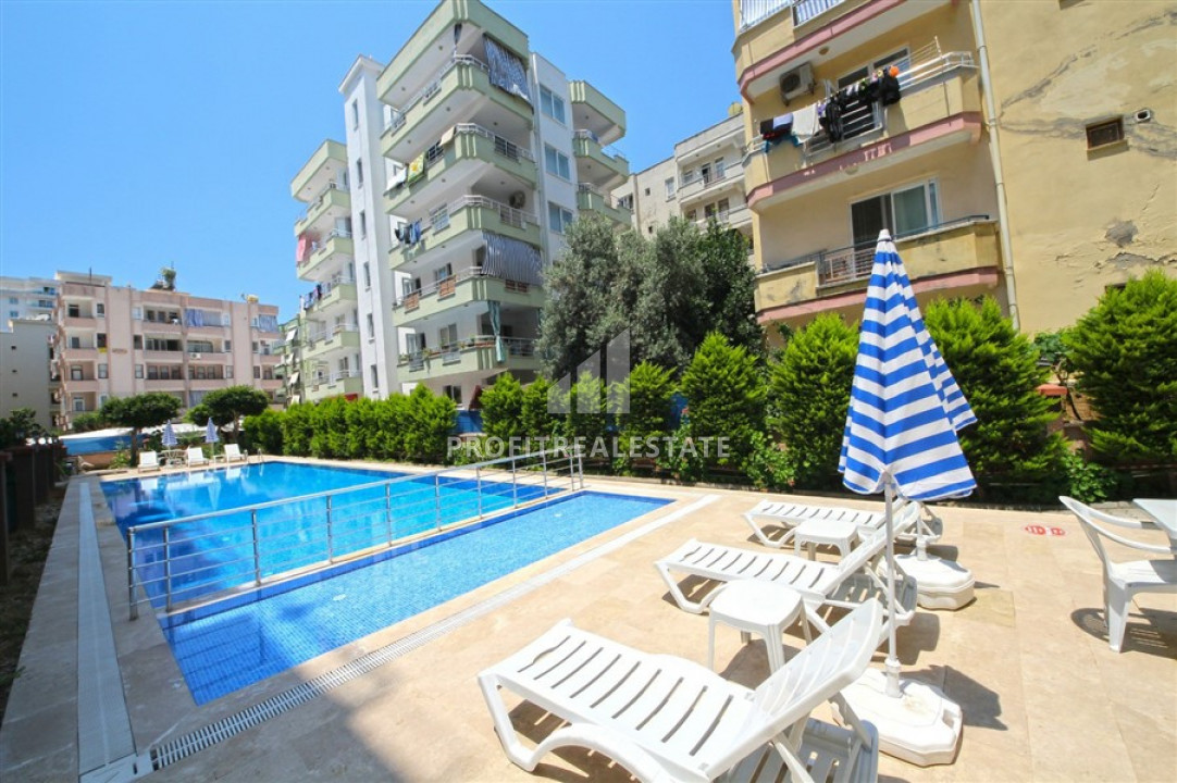 Inexpensive resale property 300m from the sea: furnished apartment 1 + 1 in Mahmutlar ID-6466 фото-2