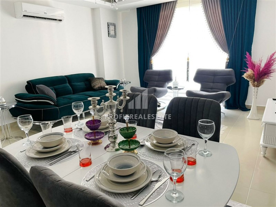 Ready to move in one bedroom apartment, in a residence with good facilities, near the sea in Mahmutlar ID-6468 фото-1