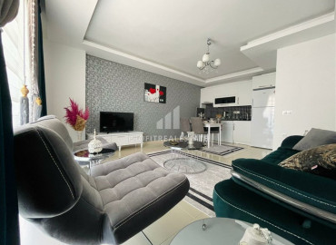 Ready to move in one bedroom apartment, in a residence with good facilities, near the sea in Mahmutlar ID-6468 фото-2