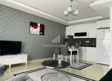 Ready to move in one bedroom apartment, in a residence with good facilities, near the sea in Mahmutlar ID-6468 фото-7