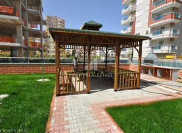 1 + 1 layout apartment in a residence with rich facilities near the sea in Mahmutlar ID-6474 фото-4