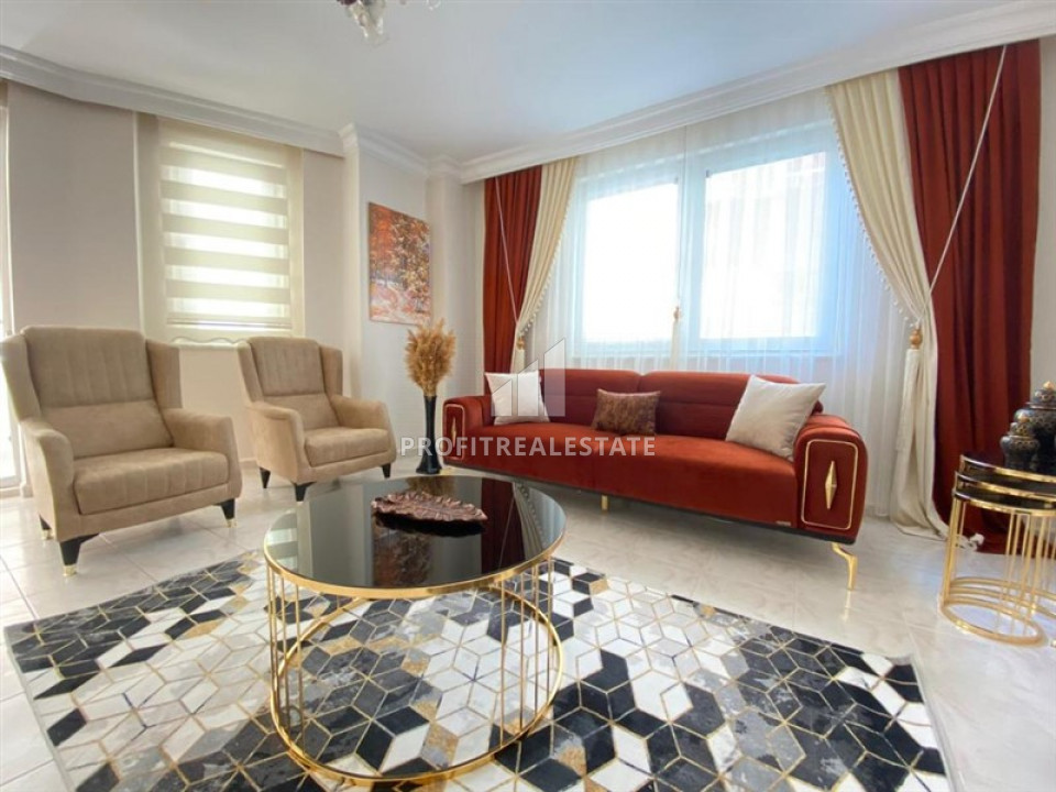 Budget furnished apartment 2 + 1 in a residence with a swimming pool 150 m from the sea in Mahmutlar ID-6478 фото-1