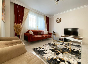 Budget furnished apartment 2 + 1 in a residence with a swimming pool 150 m from the sea in Mahmutlar ID-6478 фото-2