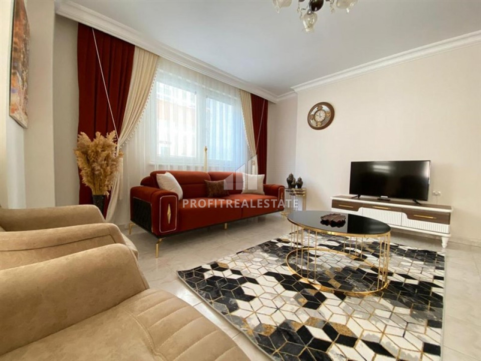Budget furnished apartment 2 + 1 in a residence with a swimming pool 150 m from the sea in Mahmutlar ID-6478 фото-2