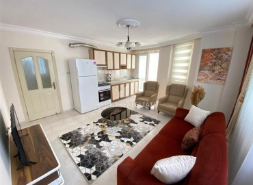 Budget furnished apartment 2 + 1 in a residence with a swimming pool 150 m from the sea in Mahmutlar ID-6478 фото-3