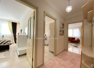 Budget furnished apartment 2 + 1 in a residence with a swimming pool 150 m from the sea in Mahmutlar ID-6478 фото-10