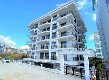 One-bedroom apartment in a new building in Mahmutlar, 300m from the sea ID-6487 фото-1