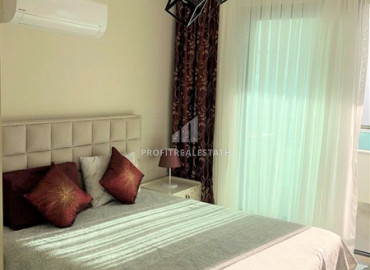 One-bedroom furnished apartment 60m² in a new residence in the center of Mahmutlar ID-6489 фото-6