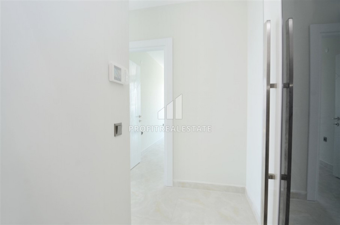 Two-bedroom apartment in a premium residence on the first line in Mahmutlar. ID-6493 фото-2