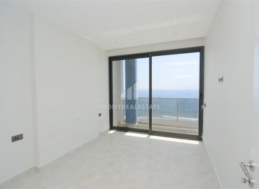 Two-bedroom apartment in a premium residence on the first line in Mahmutlar. ID-6493 фото-4