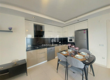Cozy view apartment 2 + 1 with furniture and appliances in a good residence of Mahmutlar ID-6499 фото-4