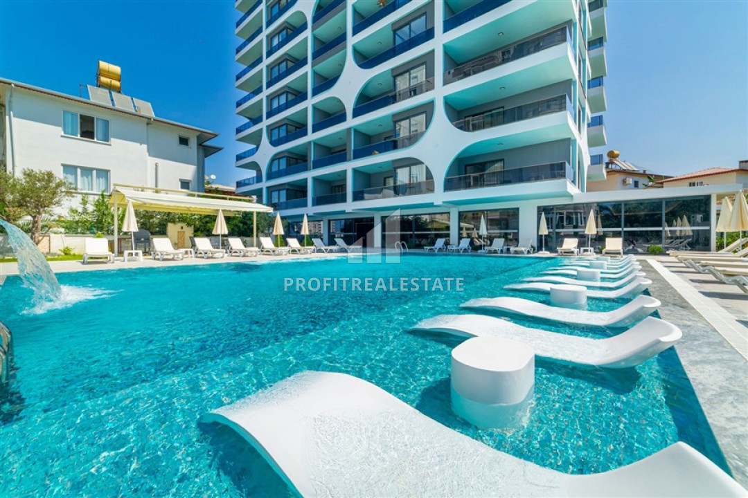 New 1 + 1 apartment with an area of 70m² in a residence with hotel facilities in Mahmutlar ID-6519 фото-2