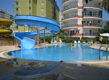 Large furnished view apartment with two bedrooms on the first line in Mahmutlar ID-6521 фото-30