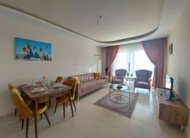 Квартира с одной спальней, площадью 68 м² с мебелью и бытовой техникой в 150м от моря в Махмутларе ID-6527 фото-1}}