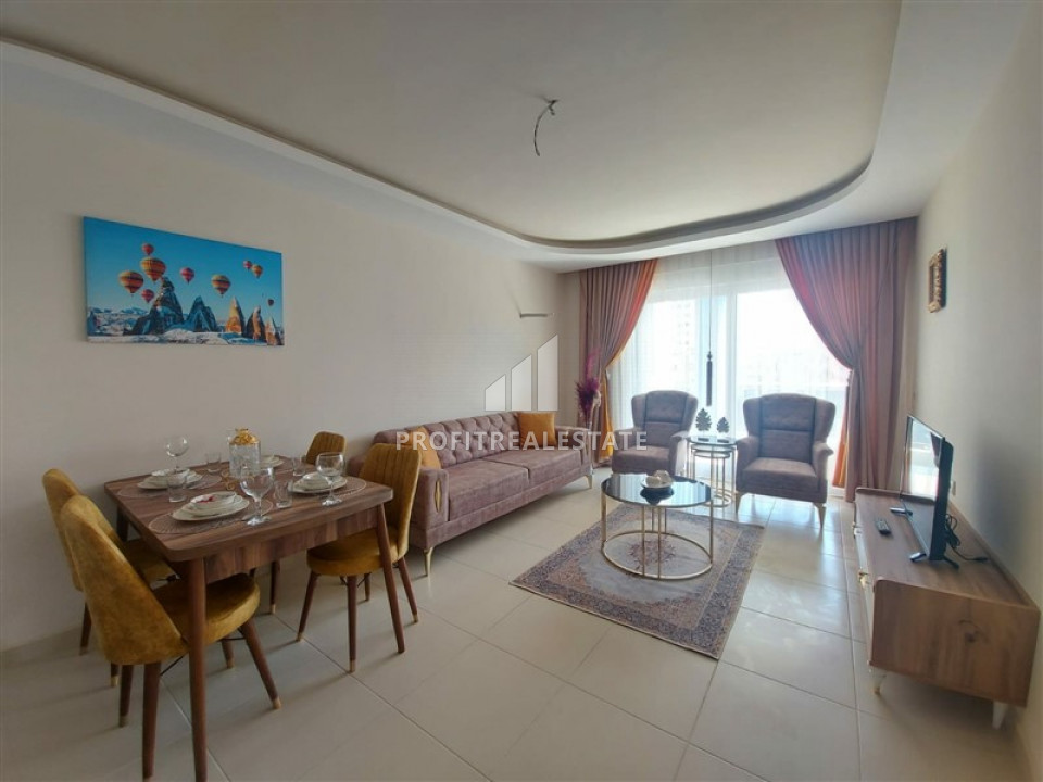 Квартира с одной спальней, площадью 68 м² с мебелью и бытовой техникой в 150м от моря в Махмутларе ID-6527 фото-1