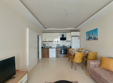 Квартира с одной спальней, площадью 68 м² с мебелью и бытовой техникой в 150м от моря в Махмутларе ID-6527 фото-3}}