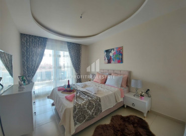 Квартира с одной спальней, площадью 68 м² с мебелью и бытовой техникой в 150м от моря в Махмутларе ID-6527 фото-4}}