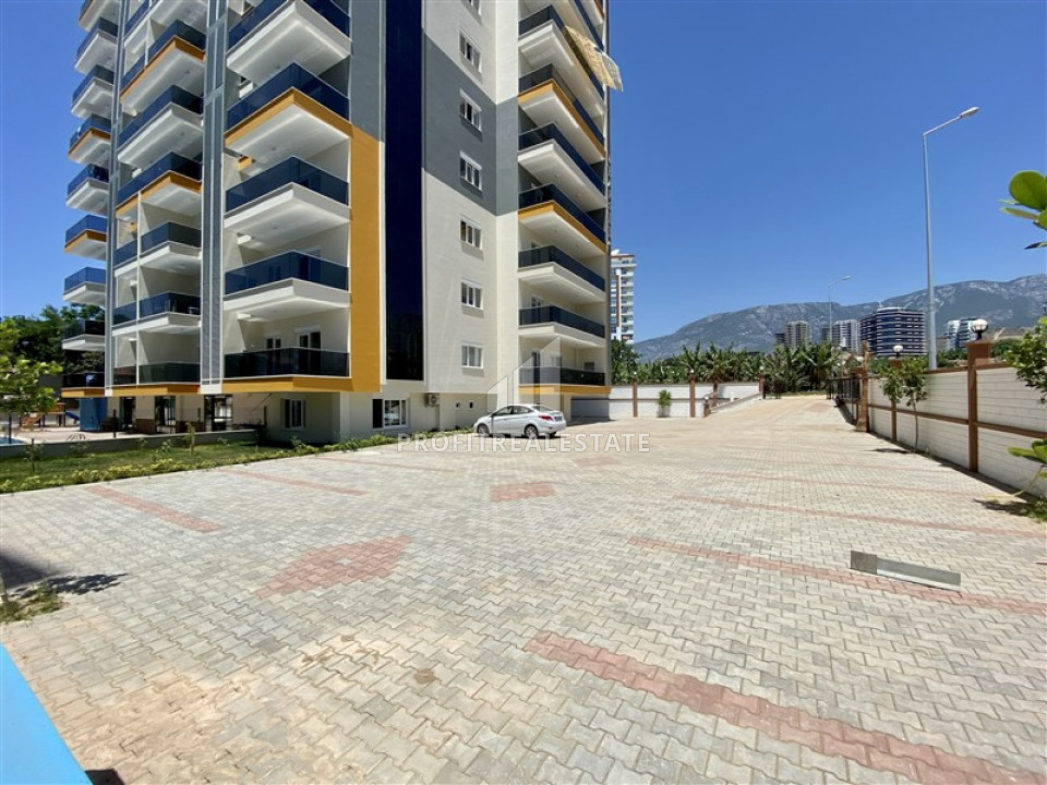 Ready to move in 1 + 1 apartment in a new residence in Mahmutlar at an excellent price ID-6535 фото-2