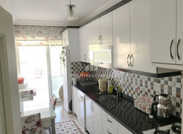 Inexpensive apartment 2 + 1 with a separate kitchen in an urban-type house 500m from the sea in Mahmutlar ID-6547 фото-6