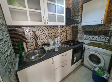 Budget two bedroom apartment in an urban-type building with a very good location in Mahmutlar ID-6550 фото-6