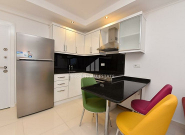 New 1 + 1 apartment with furniture and appliances in the center of Alanya, 150m from the Cleopatra beach ID-6576 фото-4}}