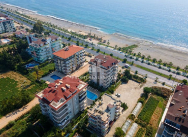 The first coastal line in the Alanya region - Kestel: two bedroom duplex with furniture and appliances ID-6591 фото-2}}