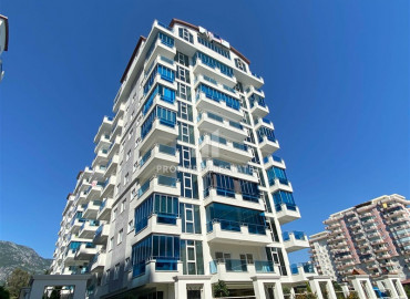 In an elite residence: 1 + 1 unfurnished apartment 400m from the beaches of Mahmutlar ID-6600 фото-1}}
