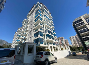 In an elite residence: 1 + 1 unfurnished apartment 400m from the beaches of Mahmutlar ID-6600 фото-23}}