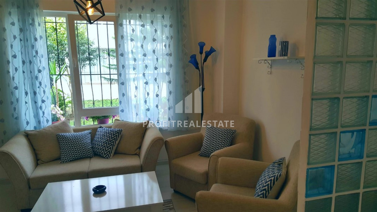 Cozy furnished two-bedroom apartment with access to the garden by the sea in the center of Alanya ID-6607 фото-2
