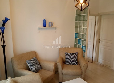Cozy furnished two-bedroom apartment with access to the garden by the sea in the center of Alanya ID-6607 фото-3}}