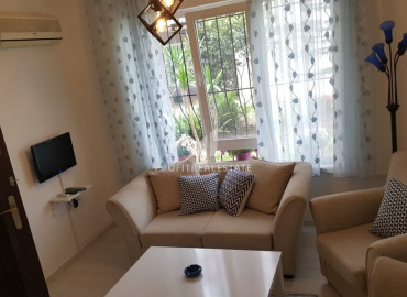 Cozy furnished two-bedroom apartment with access to the garden by the sea in the center of Alanya ID-6607 фото-4}}